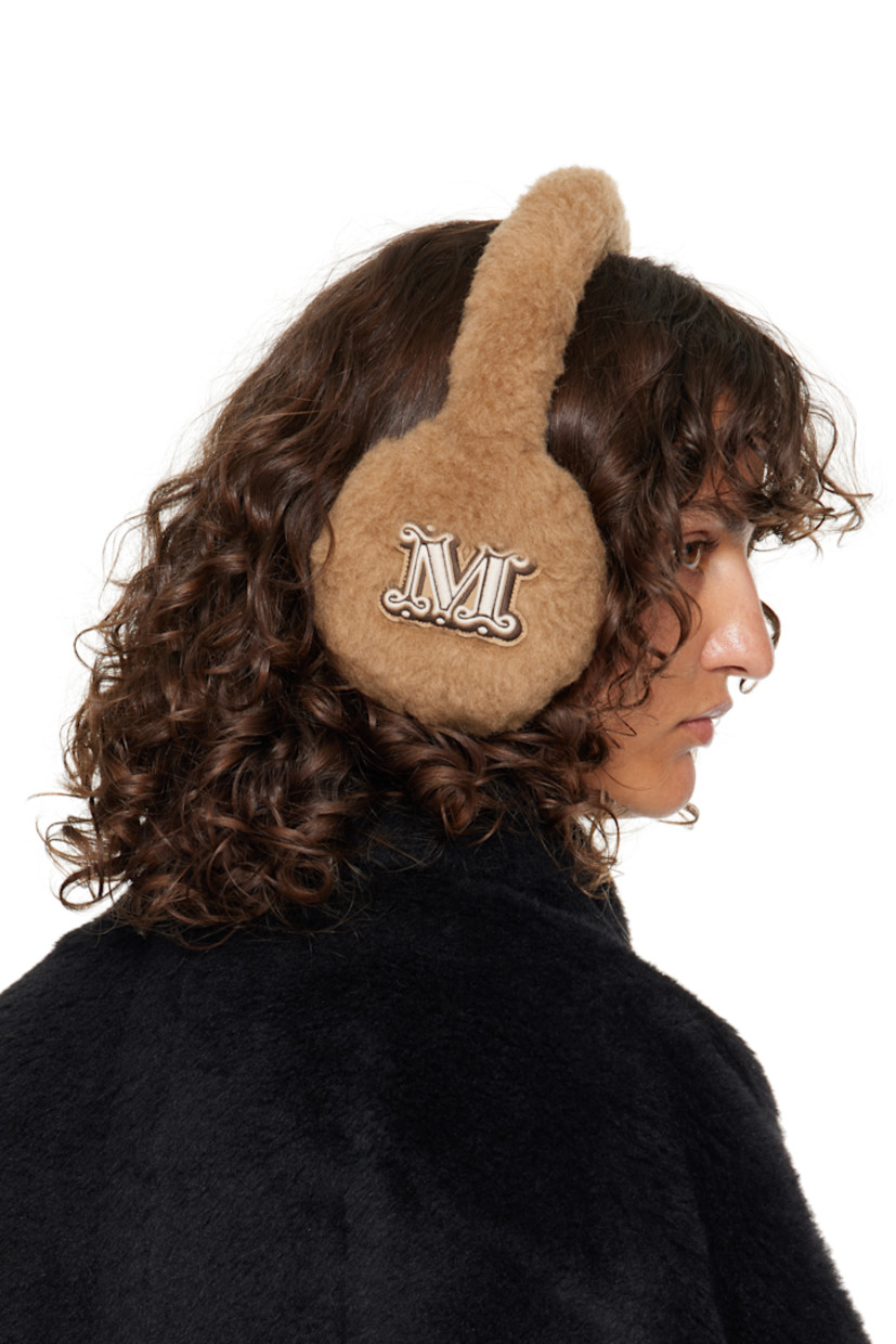 Camel wool- and silk-blend fleece ear warmers. Embroidered logo at sides.

Supplier color: Beige