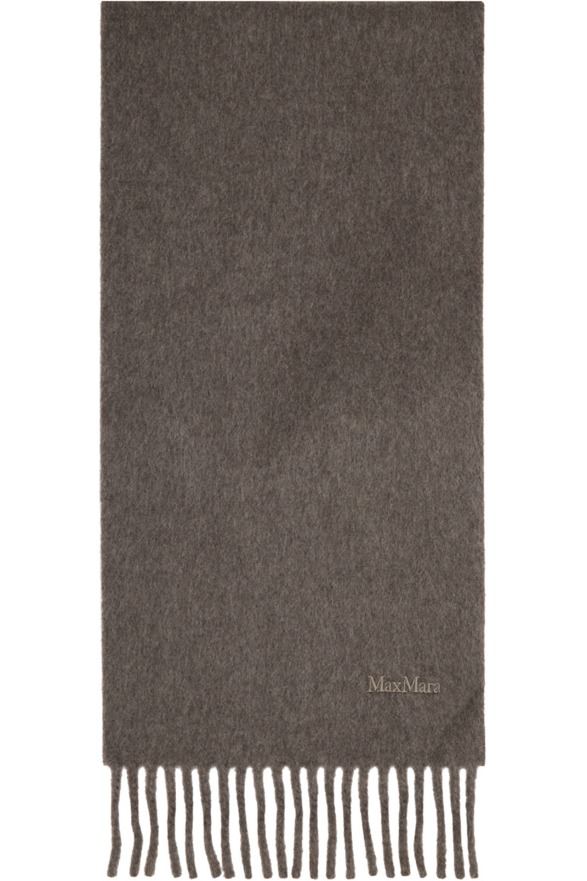 Rectangular wool flannel scarf.

· Logo embroidered at face
· Fringed detailing at ends
· L75.5" x W10"

Supplier color: Turtledove grey