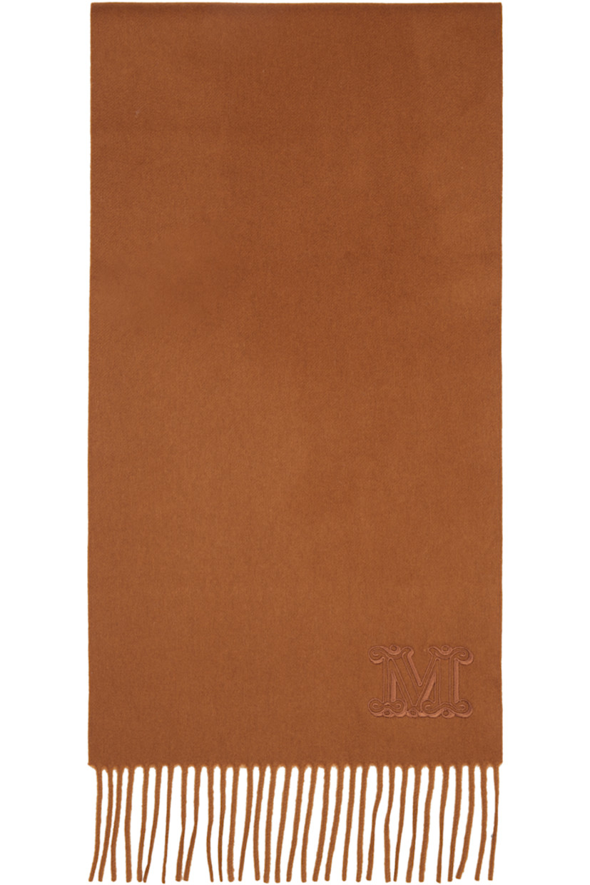 Rectangular cashmere flannel scarf.

· Logo embroidered at face
· Fringed detailing at ends
· L75" x W11"

Supplier color: Brown bronze