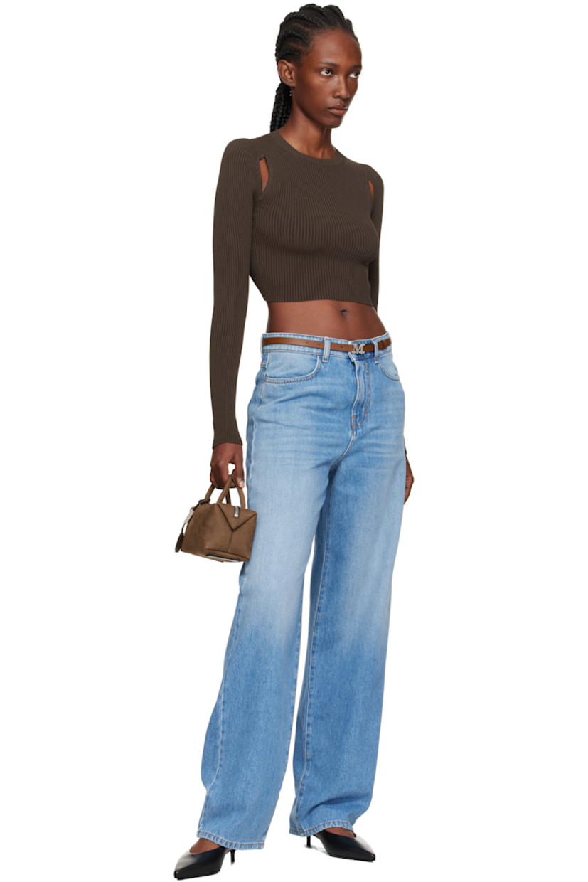 Calfskin nubuck top handle bag.

· Rolled carry handles 
· Detachable leather shoulder strap
· Detachable leather sheathed keys with logo plaque
· Logo embossed at face 
· Padlock at side
· Bumper pads at base
· Zip closure
· Card slot at goatskin suede interior 
· H4" x W6.5" x D4"

Supplier color: Dark brown