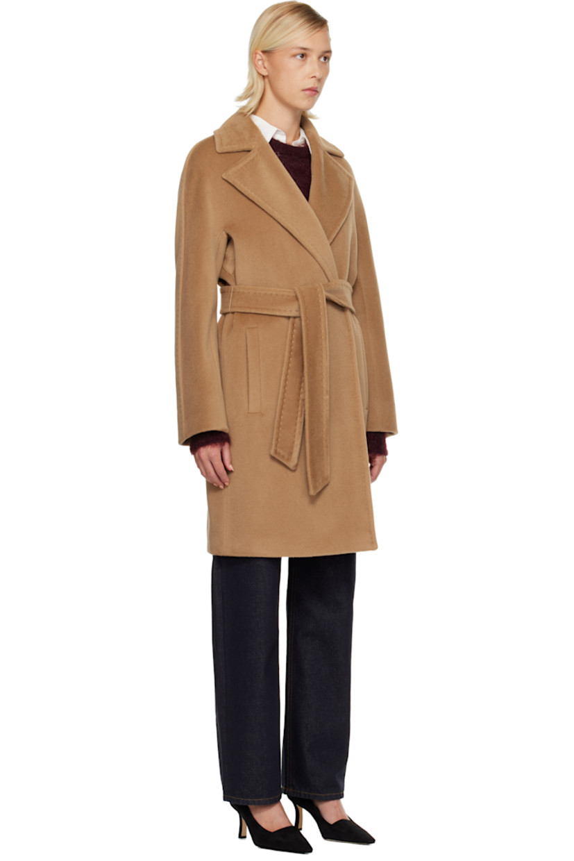Virgin wool beaver cloth coat.

· Hand-stitched detailing throughout
· Notched lapel
· Open front
· Welt pockets at waist
· Detachable self-tie belt
· Full viscose satin lining

Part of the Max Mara Studio collection.

Supplier color: Camel