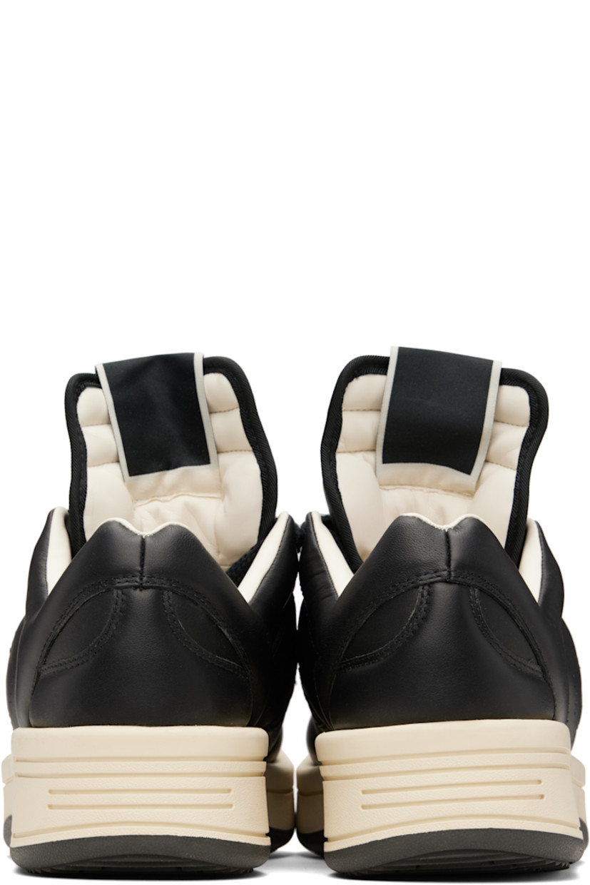 Low-top buffed leather sneakers in black.

· Perforated detailing at toe and sides
· Lace-up closure
· Logo flag at extended padded tongue
· Padded collar
· Logo cutout at sides
· Buffed faux-leather lining
· Treaded rubber platform sole
· Platform: H1.5"

Part of the Rick Owens Drkshdw x Converse collaboration.

Supplier color: Black