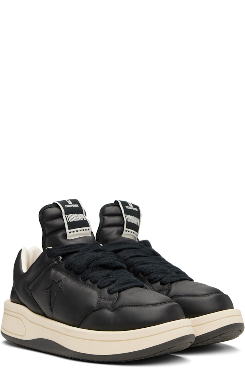 Low-top buffed leather sneakers in black.

· Perforated detailing at toe and sides
· Lace-up closure
· Logo flag at extended padded tongue
· Padded collar
· Logo cutout at sides
· Buffed faux-leather lining
· Treaded rubber platform sole
· Platform: H1.5"

Part of the Rick Owens Drkshdw x Converse collaboration.

Supplier color: Black