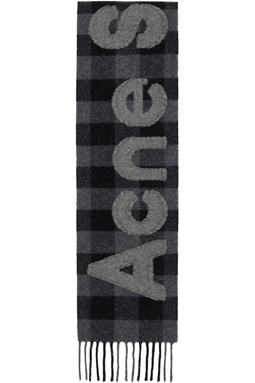 Rectangular brushed alpaca-blend flannel scarf.

· Check pattern throughout
· Logo appliqué at face
· Fringed detailing at ends
· L61.75" x W7.75"

Supplier color: Black/Grey