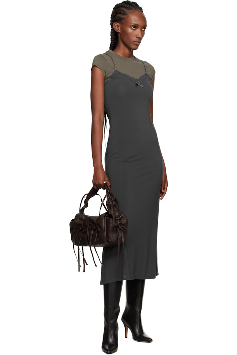 Grained nappa lambskin top handle bag.

· Bows and ruching throughout
· Embossed logo at adjustable shoulder strap
· Logo charm at face
· Flap pocket at sides
· Magnetic flap
· Patch pocket at interior
· Logo-engraved antiqued copper-tone hardware
· H6.5" x W14" x D4"

Supplier color: Chocolate brown