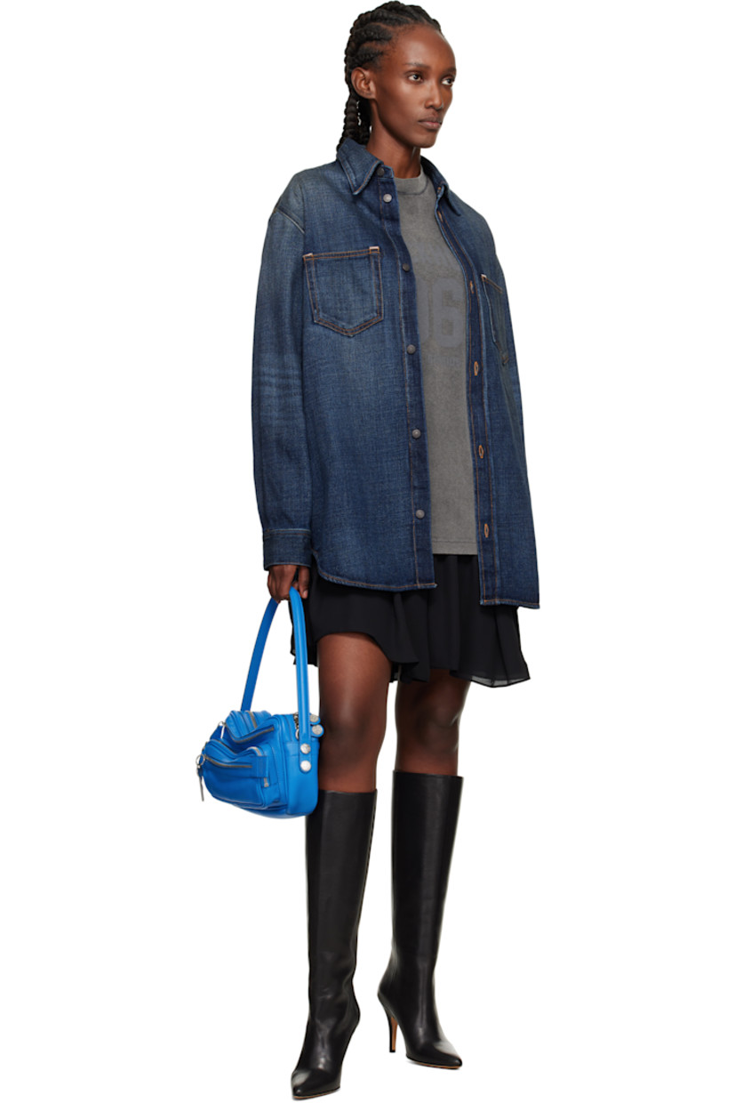 Grained calfskin shoulder bag.

· Fixed shoulder strap
· Adjustable and detachable crossbody strap
· Zip pockets and logo-engraved hardware at face
· Patch pocket at back face
· Two-way zip closure
· Faux-leather interior
· Logo-engraved silver-tone hardware
· H6.25" x W11" x D4"

Supplier color: Cobalt blue