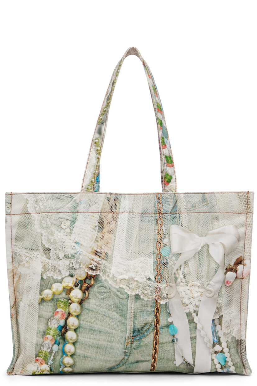 Cotton canvas tote.

· Graphic printed throughout
· Fixed shoulder straps
· Logo embossed at face
· Clasp fastening at throat
· Zip and patch pocket at interior
· Twill lining
· H13" x W18" x D7"

Supplier color: White/Green