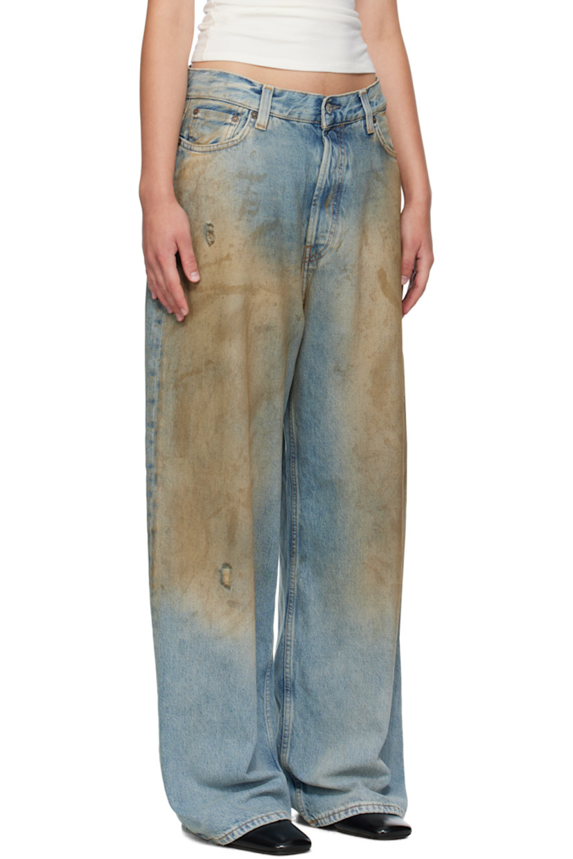 Non-stretch denim jeans. 

· Fading, distressing, and whiskering throughout 
· Loose-fit 
· Low-rise 
· Belt loops
· Five-pocket styling
· Button fly 
· Leather logo patch at back waistband 

Supplier color: Mid blue
