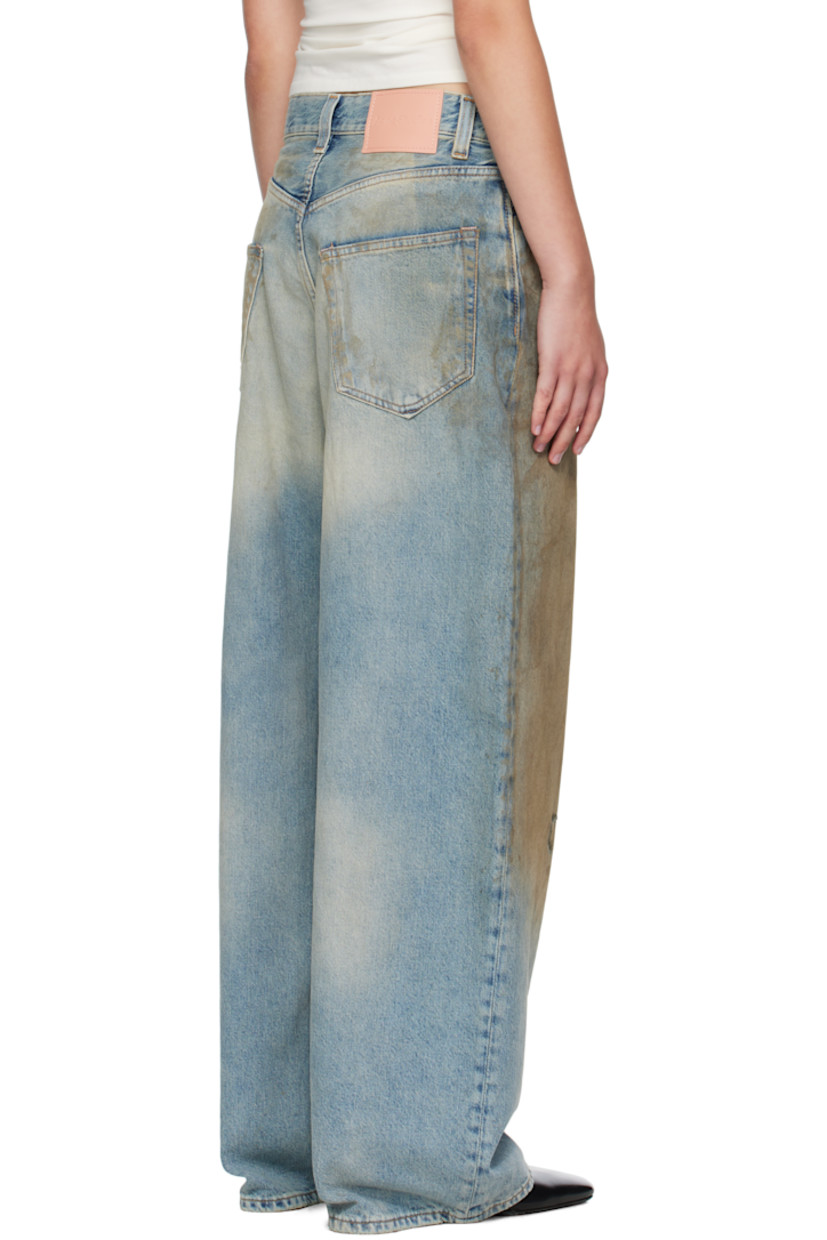 Non-stretch denim jeans. 

· Fading, distressing, and whiskering throughout 
· Loose-fit 
· Low-rise 
· Belt loops
· Five-pocket styling
· Button fly 
· Leather logo patch at back waistband 

Supplier color: Mid blue