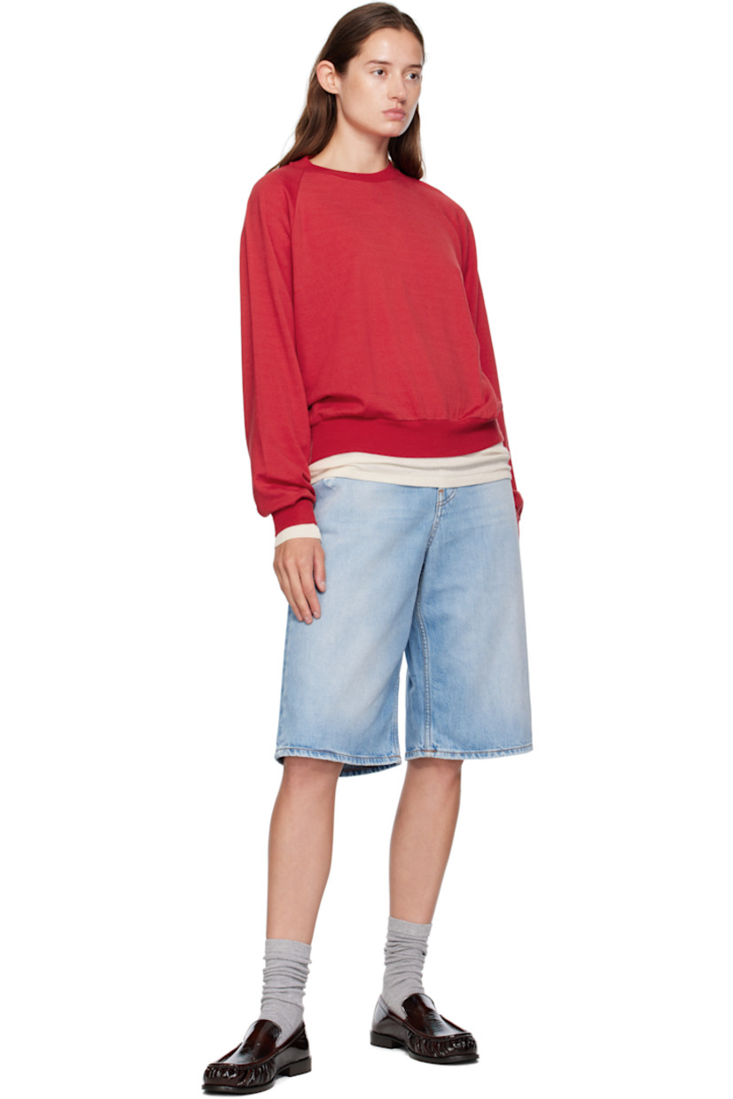 Non-stretch organic cotton denim shorts.

· Fading, distressing, and whiskering throughout
· Straight-leg
· Belt loops
· Five-pocket styling
· Zip fly
· Logo patch at back waistband
· Contrast stitching in tan

Supplier color: Light blue