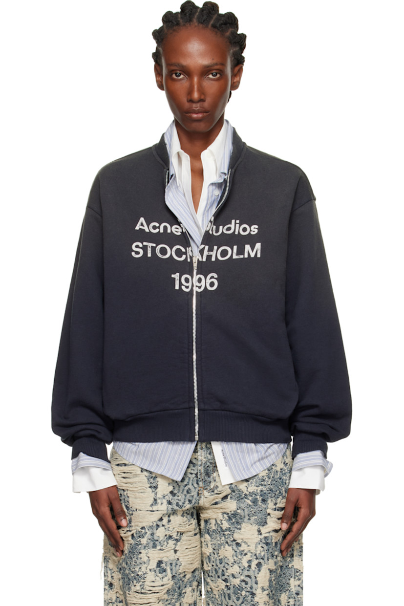 Organic cotton-blend French terry sweatshirt.

· Piling, distressing, and fading throughout
· Rib-knit stand collar, hem, and cuffs
· Zip closure
· Logo printed at front
· Seam pockets at waist
· Dropped shoulders

Supplier color: Faded black