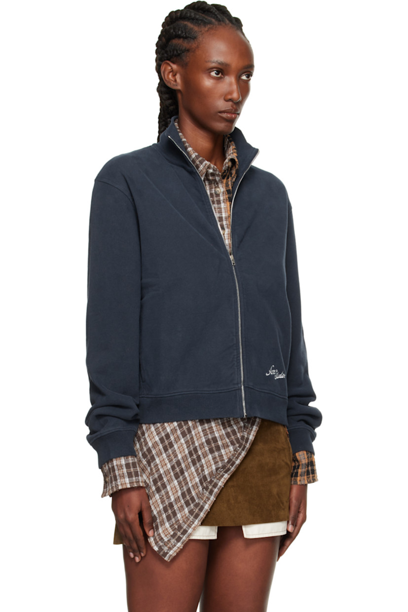 Hand-brushed organic cotton fleece jacket. 

· Fading throughout 
· Rib-knit stand collar, hem, and cuffs
· Zip closure 
· Seam pockets at waist 
· Logo embroidered at front hem and back 

Supplier color: Deep blue
