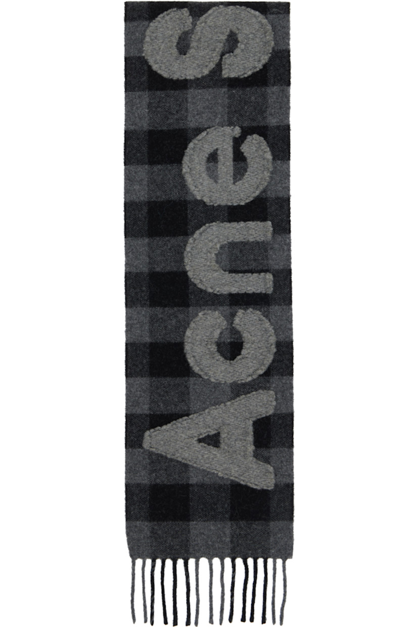 Rectangular felted knit wool-blend scarf.

· RWS-certified wool
· Check pattern throughout
· Fil-coupé logo at face
· Fringed ends
· L60" x W7"

Supplier color: Black/Grey