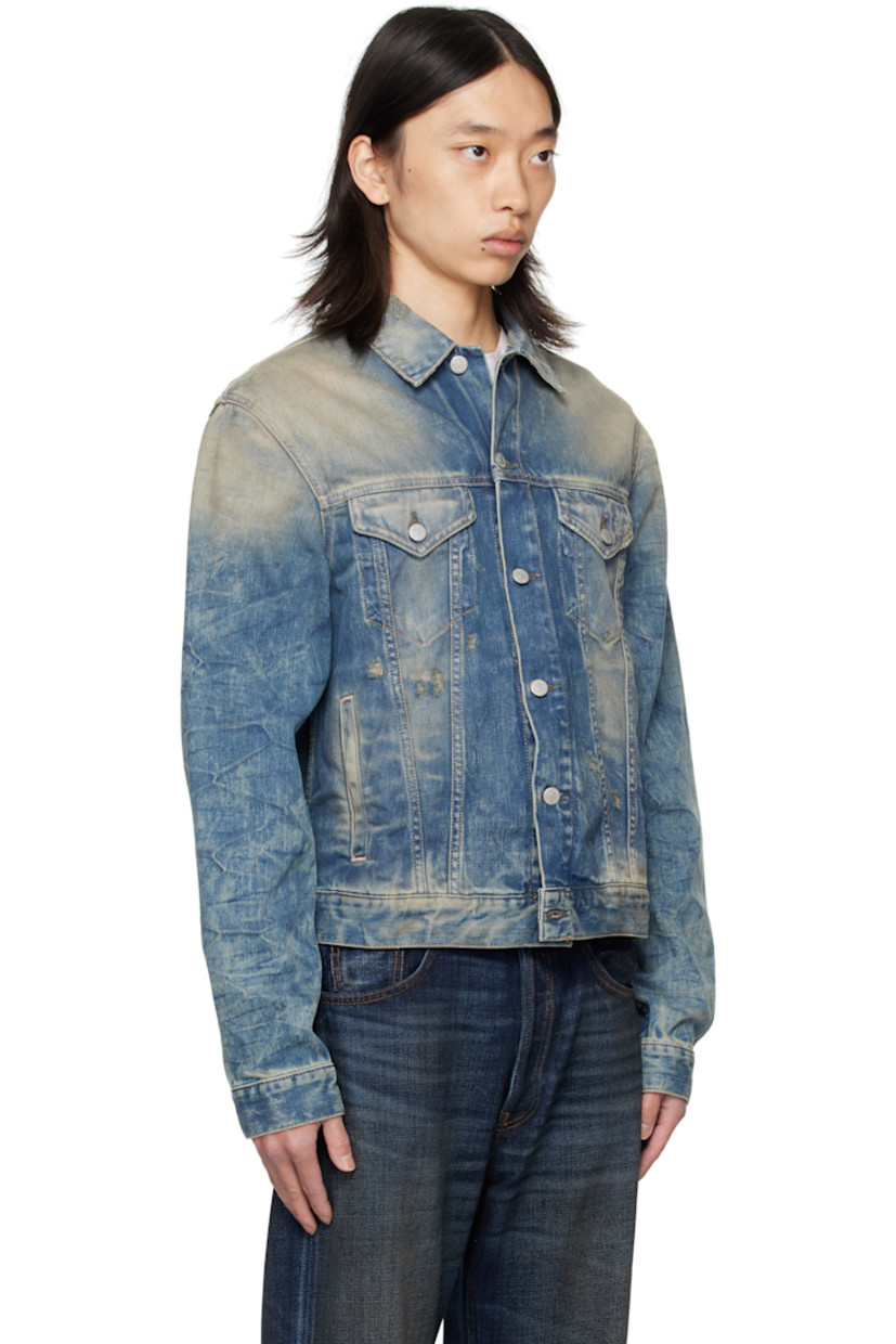 Non-stretch denim jacket.

· Fading and distressing throughout
· Spread collar
· Button closure
· Flap pockets at chest
· Welt pockets at waist
· Buttoned cuffs
· Adjustable buttoned tabs at back hem

Supplier color: Auz Mid Blue