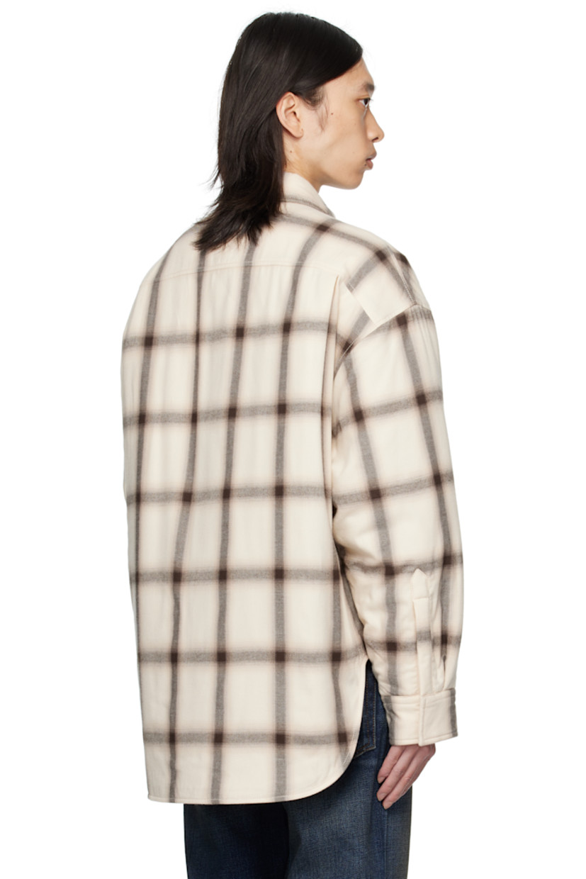 Insulated organic cotton flannel overshirt. 

· Check pattern throughout
· Spread collar
· Press-stud closure
· Welt pockets at waist
· Shirttail hem
· Dropped shoulders
· Press-stud barrel cuffs
· Logo embroidered at back collar
· Pleats at back yoke
· Quilted satin lining

Supplier color: Beige/Multi