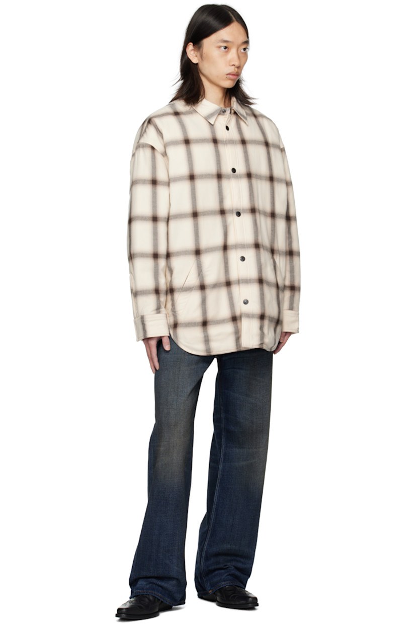 Insulated organic cotton flannel overshirt. 

· Check pattern throughout
· Spread collar
· Press-stud closure
· Welt pockets at waist
· Shirttail hem
· Dropped shoulders
· Press-stud barrel cuffs
· Logo embroidered at back collar
· Pleats at back yoke
· Quilted satin lining

Supplier color: Beige/Multi