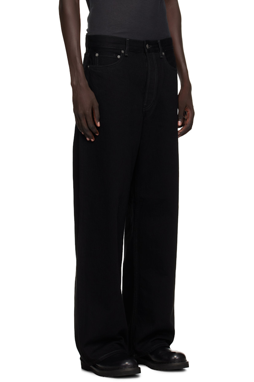 Non-stretch organic cotton denim jeans. 

· Wide-leg
· Belt loops
· Five-pocket styling
· Button fly
· Leather logo patch at back waistband
· Logo-engraved antiqued silver-tone hardware

Supplier color: Black