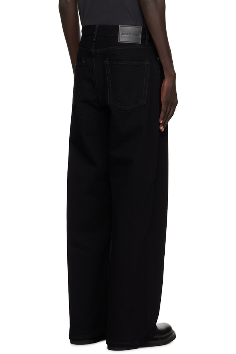 Non-stretch organic cotton denim jeans. 

· Wide-leg
· Belt loops
· Five-pocket styling
· Button fly
· Leather logo patch at back waistband
· Logo-engraved antiqued silver-tone hardware

Supplier color: Black