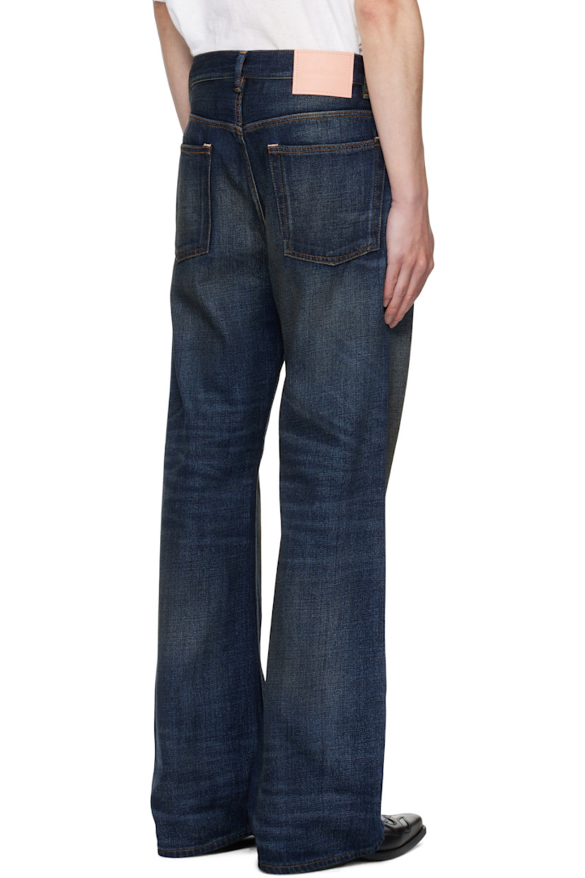 Non-stretch denim jeans.

· Fading, smudging, and whiskering throughout
· Belt loops
· Detachable denim belt at waistband
· Five-pocket styling
· Button fly
· Leather logo patch at back waistband
· Contrast stitching in brown 

Supplier color: Dark blue