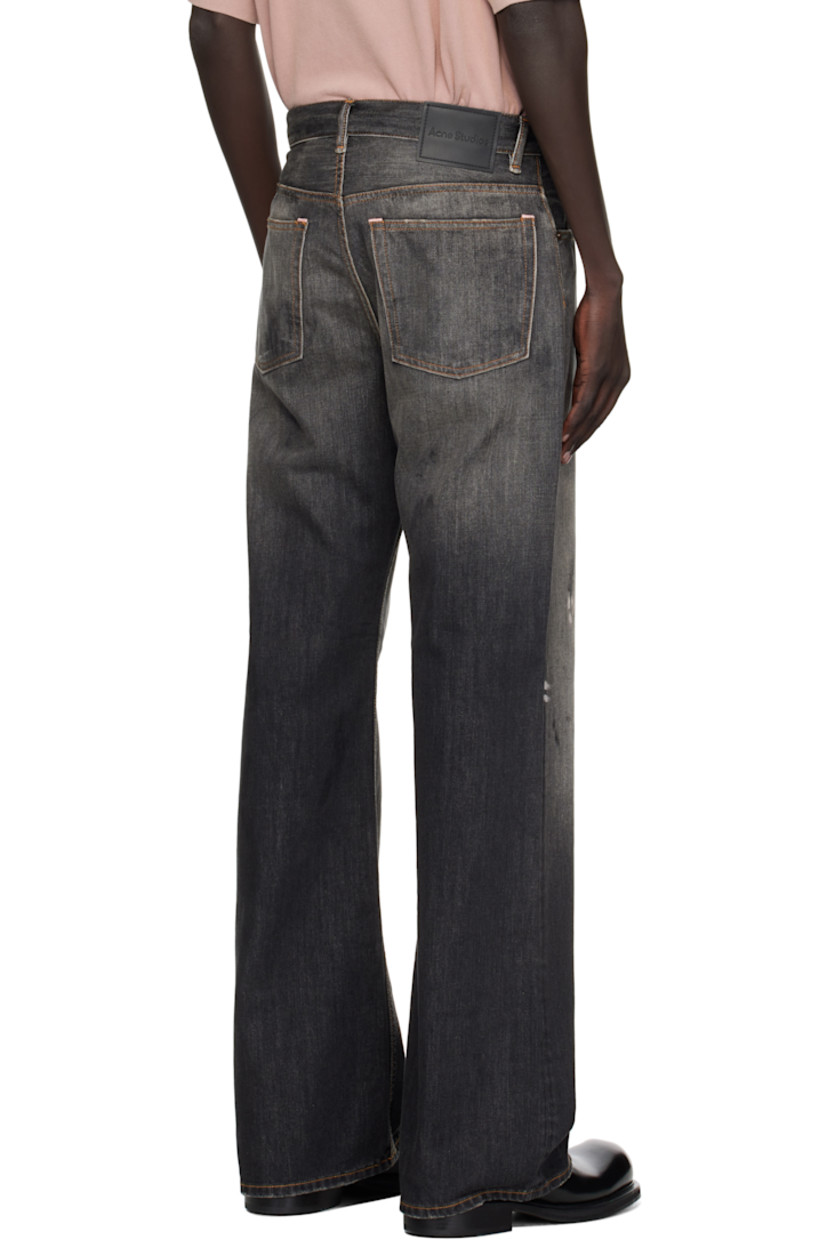 Non-stretch organic cotton denim jeans.

· Fading, paint splatters, distressing, and smudging throughout
· Straight-leg
· Mid-rise
· Belt loops
· Five-pocket styling
· Button fly
· Leather logo patch at back waistband
· Logo-engraved copper- and silver-tone hardware
· Contrast stitching in tan

Supplier color: Black