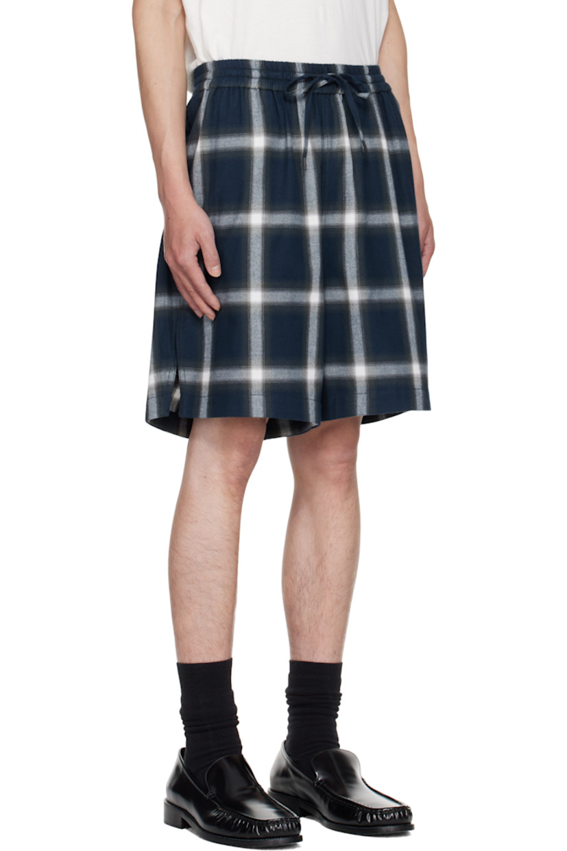Cotton flannel shorts.

· Check pattern throughout
· Drawstring at elasticized waistband
· Three-pocket styling
· Vented cuffs
· Logo embroidered at back pocket

Supplier color: Navy/Multi