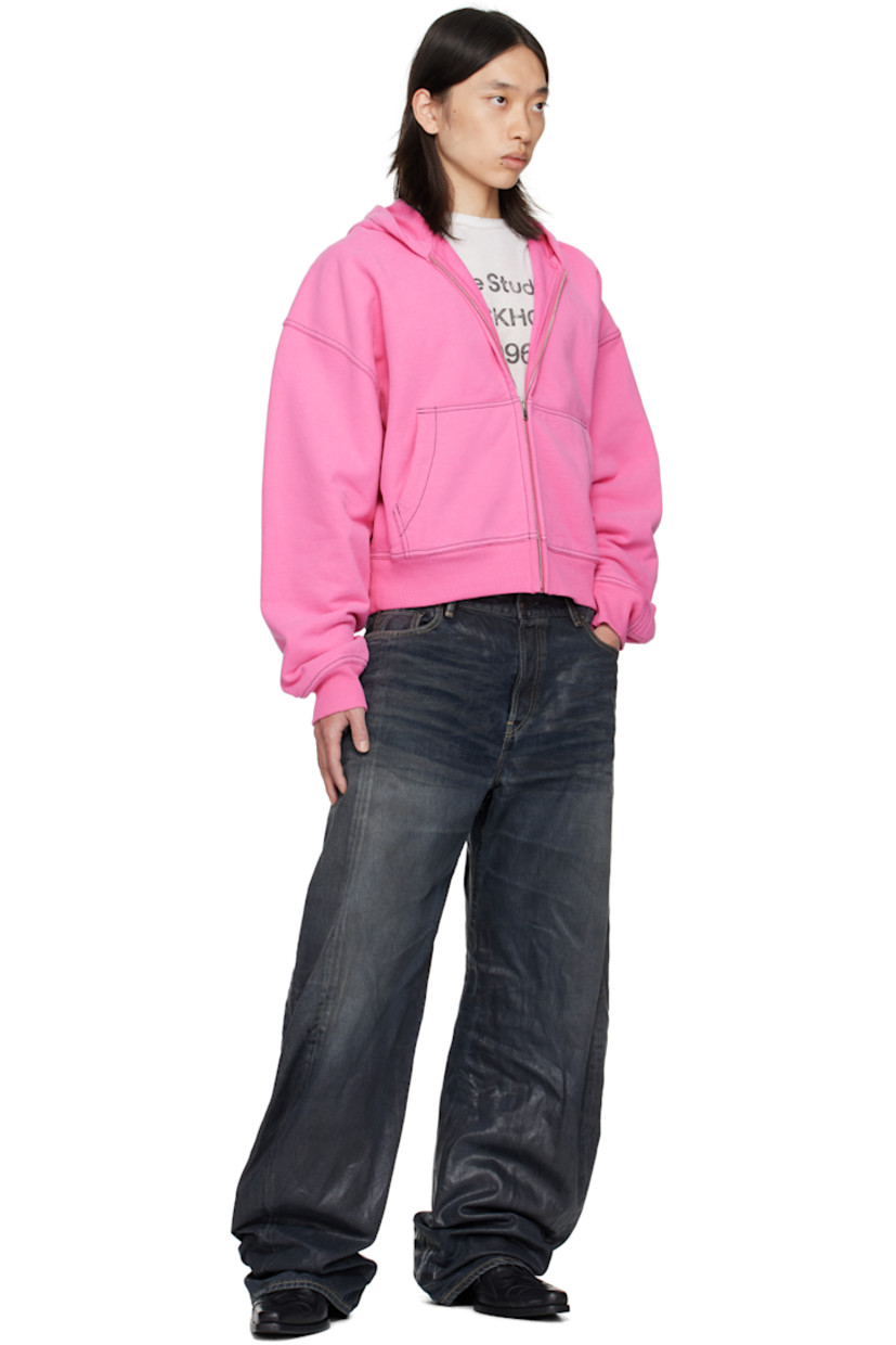 Organic cotton fleece hoodie.

· Zip closure
· Patch pockets at front
· Rib-knit hem and cuffs
· Dropped shoulders
· Logo embroidered at back
· Contrast stitching in black

Supplier color: Pink