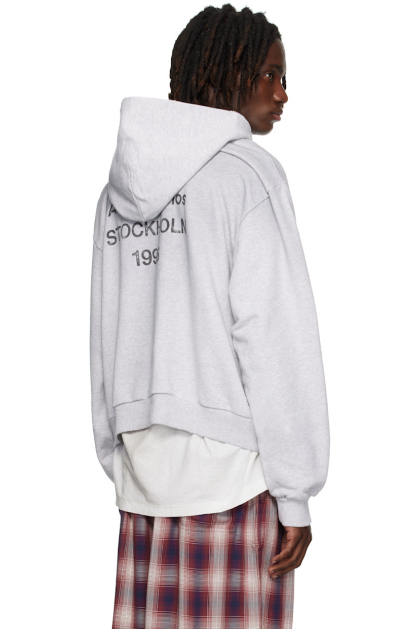 Organic cotton- and recycled polyester-blend French terry hoodie.

· Distressing throughout
· Seam pockets at waist
· Rib-knit hem and cuffs
· Dropped shoulders
· Logo printed at back

Supplier color: Pale grey melange