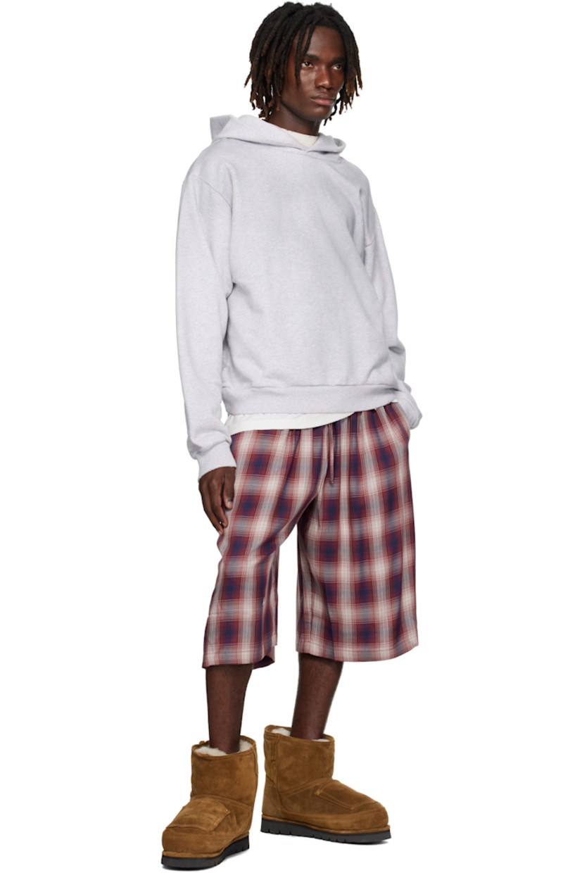 Organic cotton- and recycled polyester-blend French terry hoodie.

· Distressing throughout
· Seam pockets at waist
· Rib-knit hem and cuffs
· Dropped shoulders
· Logo printed at back

Supplier color: Pale grey melange