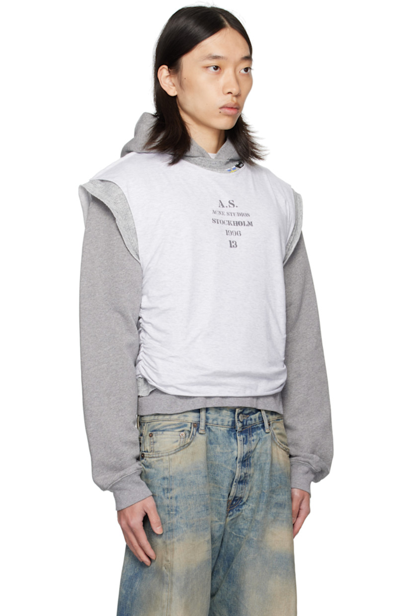 Organic cotton fleece hoodie. Integrated and sleeveless cotton fleece sweatshirt-style overlay with tank top overlay. 
 
· Raw edges throughout
· Logo flags at crewneck
· Printed logo at chest
· Cropped hem

Supplier color: Grey melange