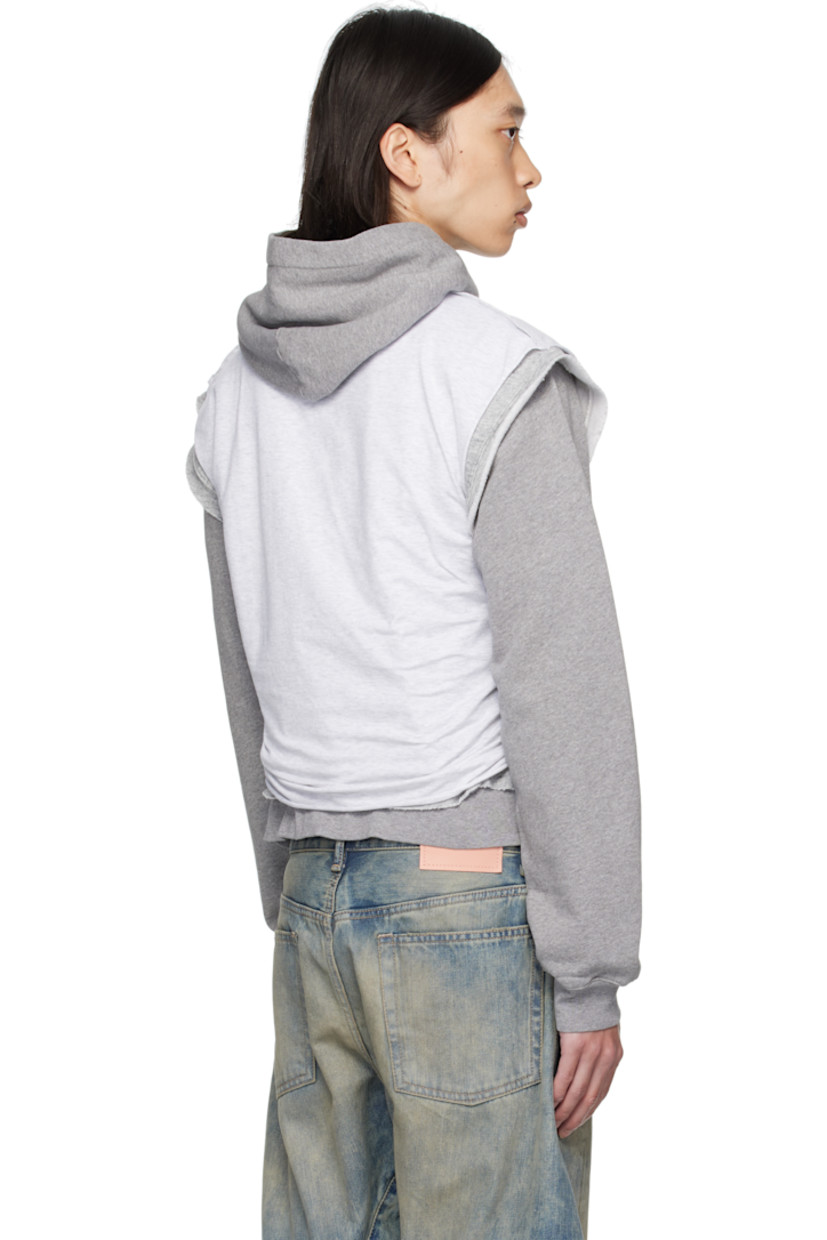 Organic cotton fleece hoodie. Integrated and sleeveless cotton fleece sweatshirt-style overlay with tank top overlay. 
 
· Raw edges throughout
· Logo flags at crewneck
· Printed logo at chest
· Cropped hem

Supplier color: Grey melange