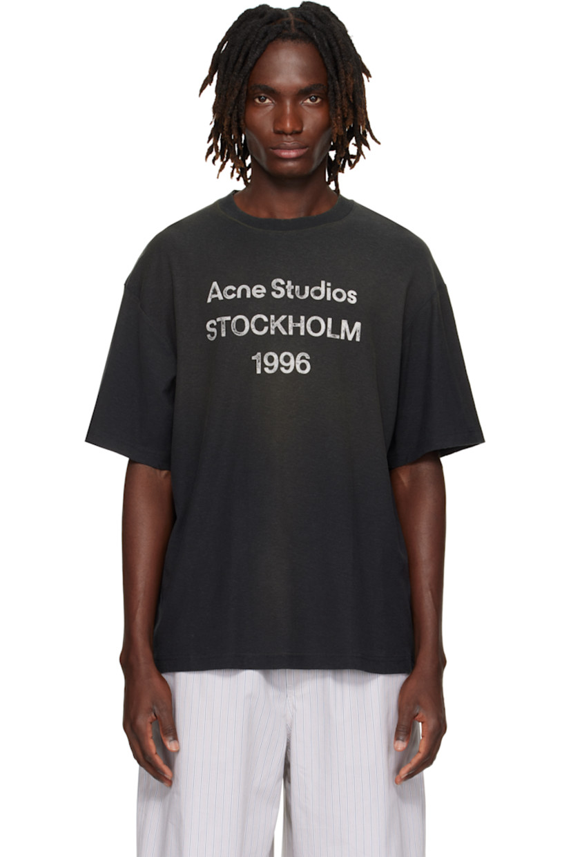 Organic cotton- and True hemp-blend jersey T-shirt. 

· Fading and subtle distressing throughout 
· Rib-knit crewneck
· Logo and text printed at front 
· Dropped shoulders

Supplier color: Faded black