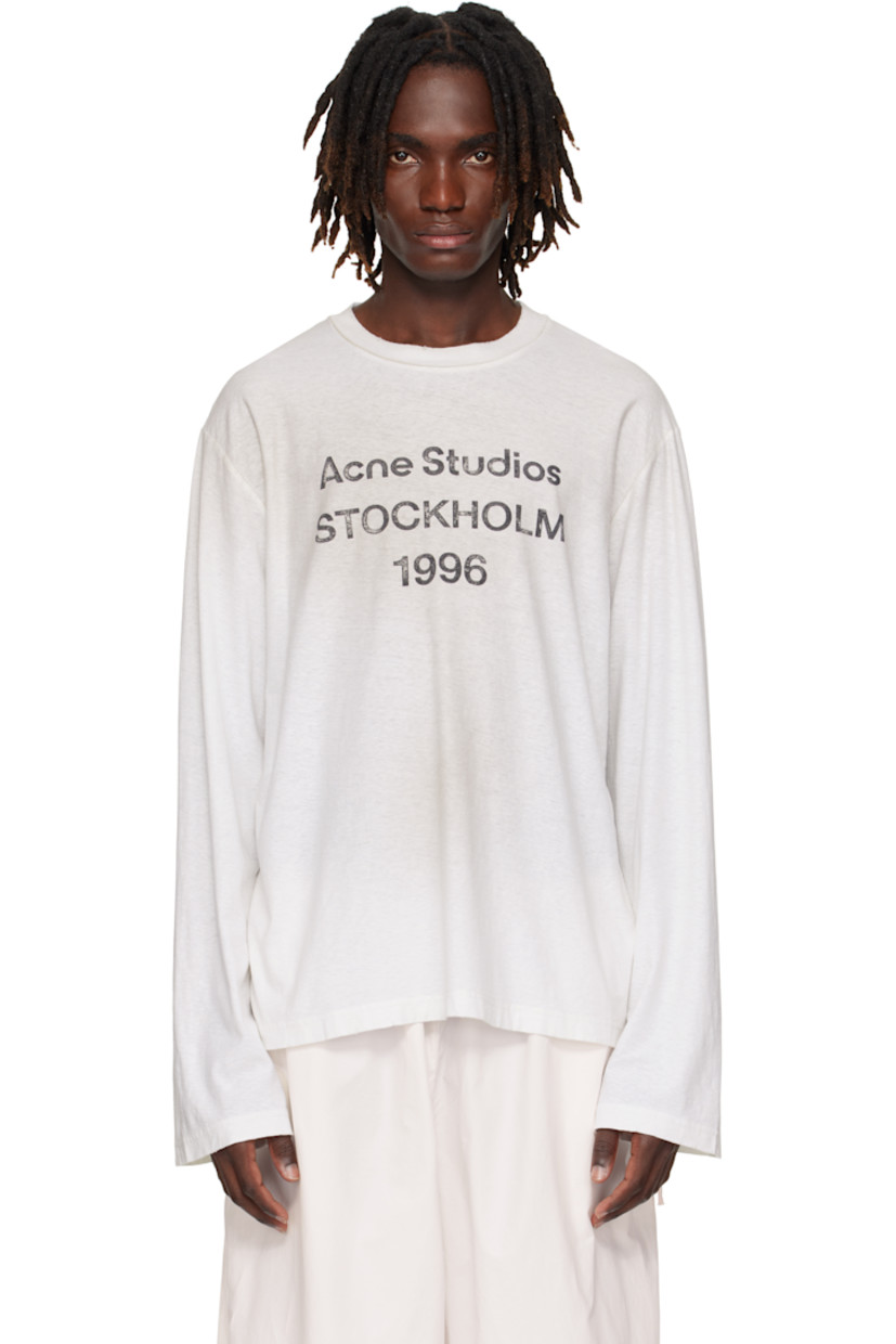 Organic cotton- and True hemp-blend jersey T-shirt. 

· Discoloration and subtle distressing throughout 
· Rib-knit crewneck
· Logo and text printed at front 
· Dropped shoulders

Supplier color: Dusty white