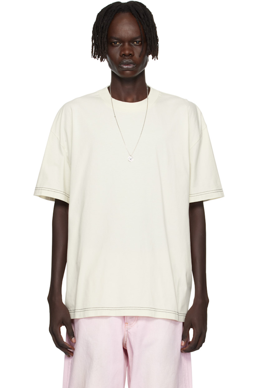 Organic cotton jersey T-shirt.

· Rib-knit crewneck
· Dropped shoulders
· Logo embroidered at back
· Contrast stitching in black

Supplier color: Off white