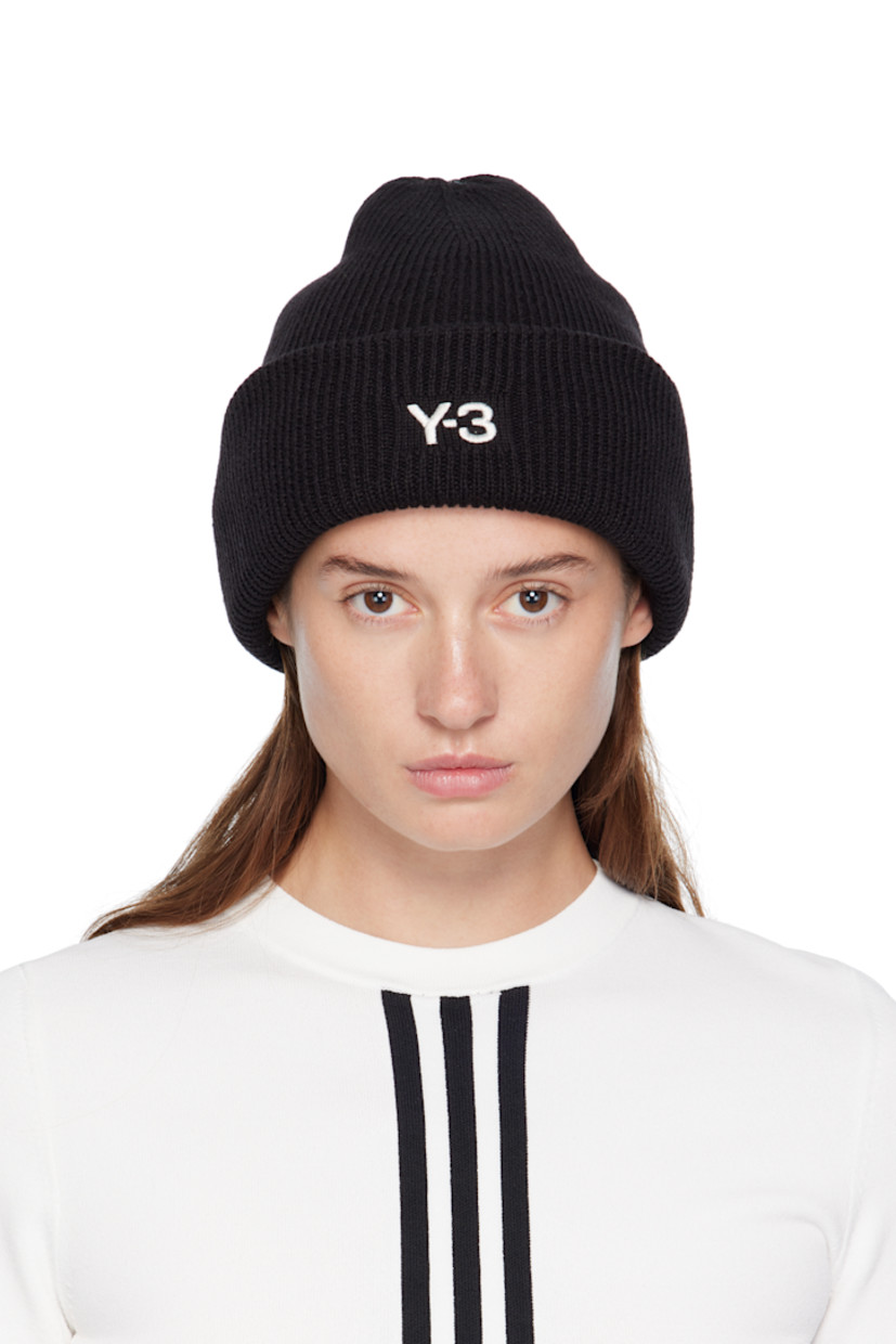 Rib-knit wool-blend beanie. Logo embroidered at rolled brim.

Supplier color: Black