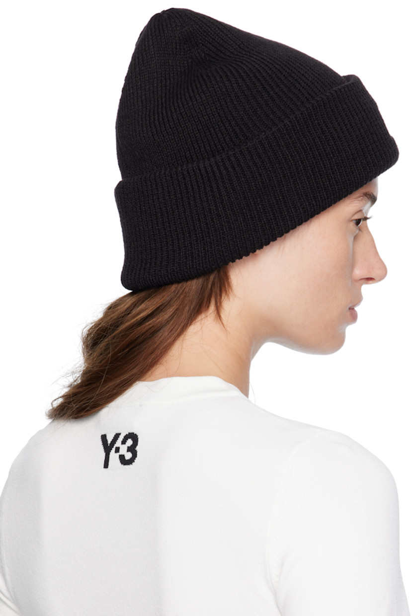 Rib-knit wool-blend beanie. Logo embroidered at rolled brim.

Supplier color: Black