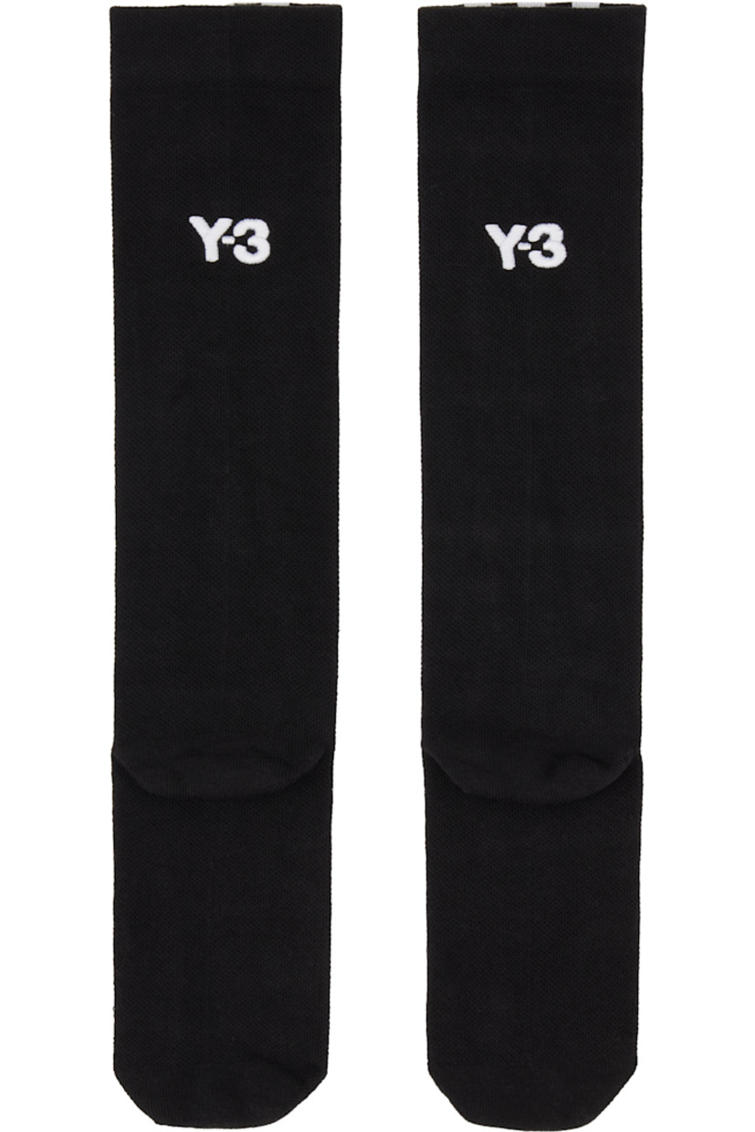 Calf-high knit stretch cotton- and recycled nylon-blend socks.

· Jacquard signature stripes at face
· Logo embroidered at heel

Supplier color: Black