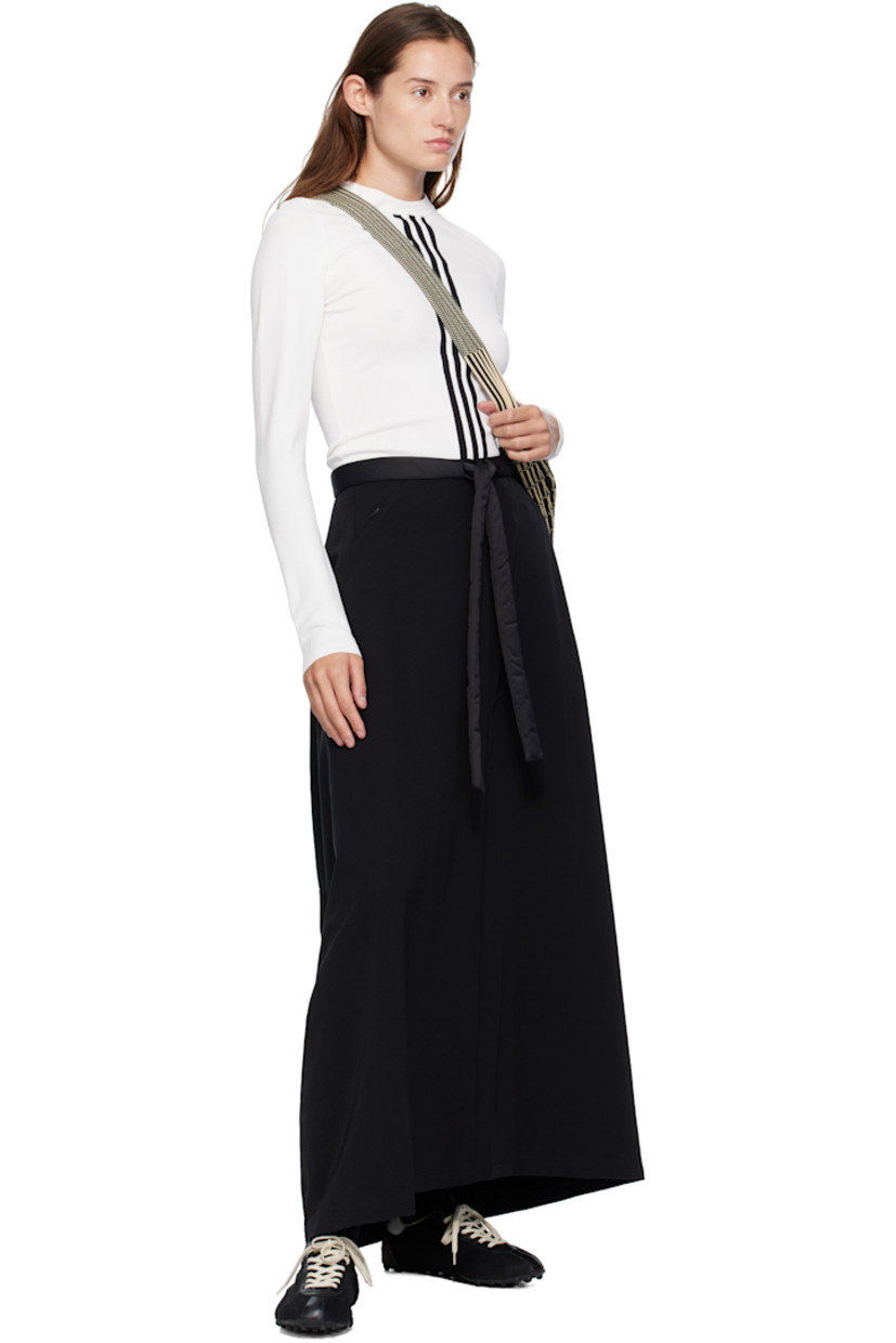 Stretch nylon-blend canvas midi skirt.

· Padded satin drawstring at satin waistband
· Two-pocket styling
· Bonded logo at front 
· Zip closure with hook-eye at back waist

Supplier color: Black