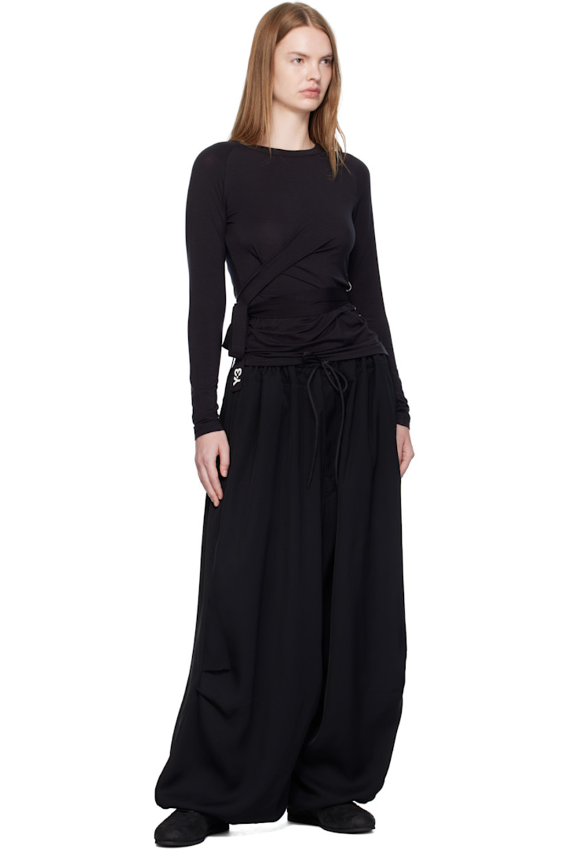 Stretch TENCEL™ lyocell jersey T-shirt.

· Rib-knit crewneck
· Draping and integrated self-tie straps at waist
· Stripe appliqués at side seam
· Raglan sleeves

Supplier color: Black