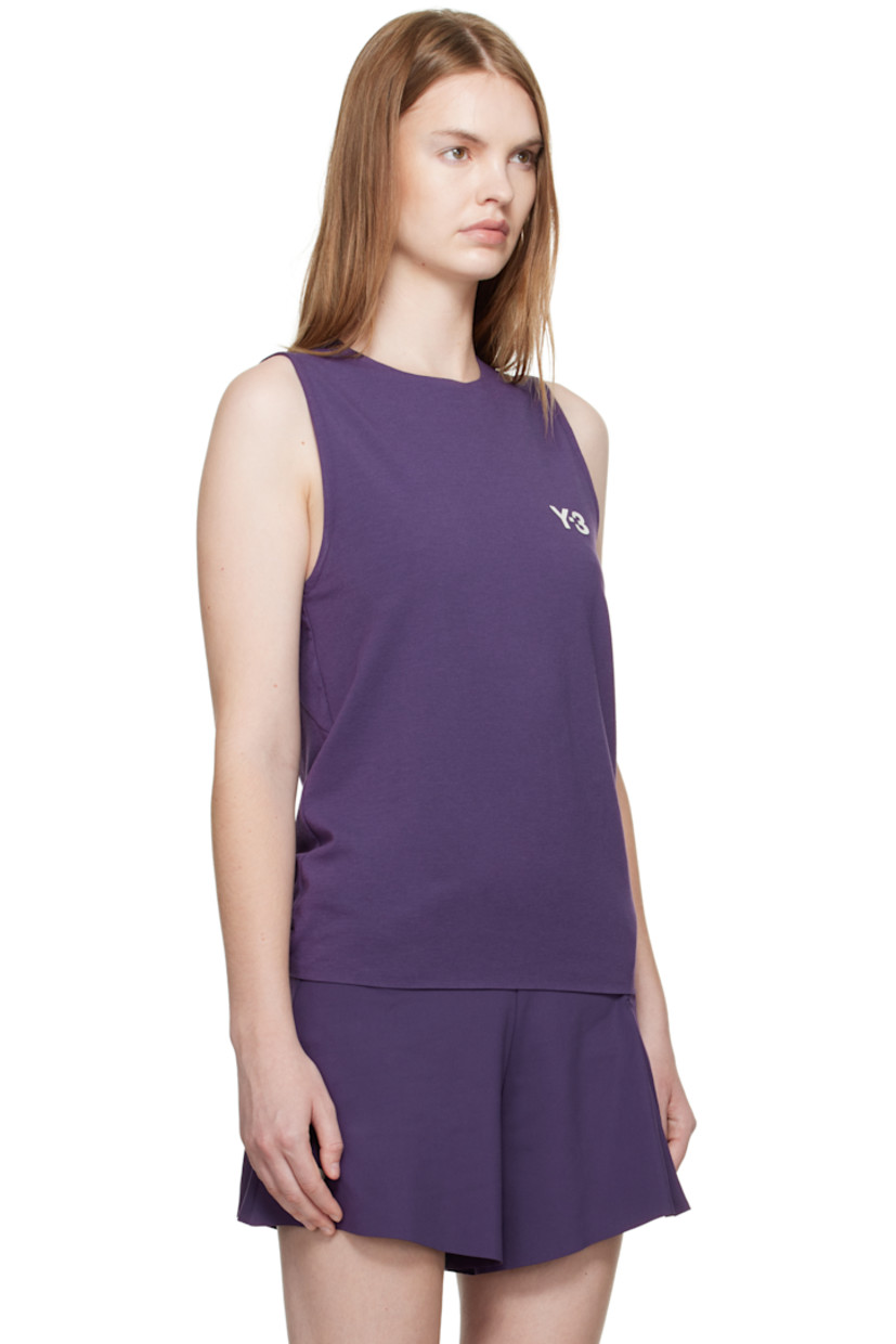 Stretch recycled polyester- and cotton-blend jersey tank top. 

· Round neck
· Bonded logo at chest
· Cutout at back 

Part of the US Open capsule.

Supplier color: Aurora plum