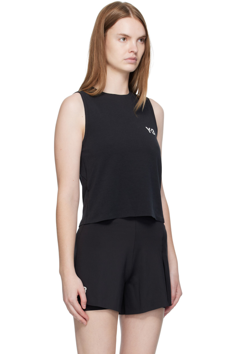 Stretch recycled polyester- and cotton-blend jersey sport top.

· Paneled construction
· Round neck
· Bonded logo at chest
· Cutout at back

Supplier color: Black