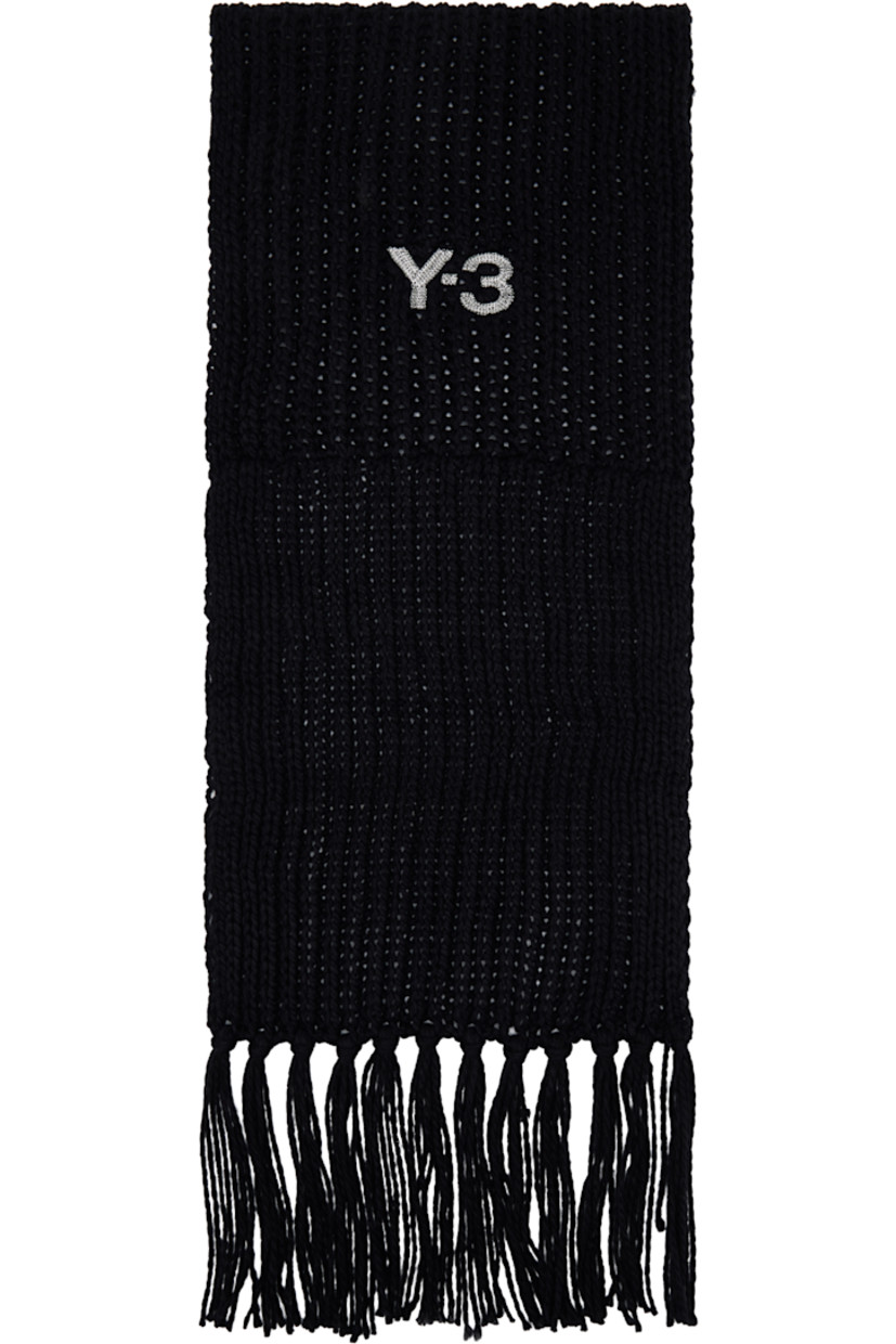 Rectangular rib-knit scarf.

· Logo embroidered at length
· Fringed detailing at ends
· L117" x W13"

Supplier color: Black