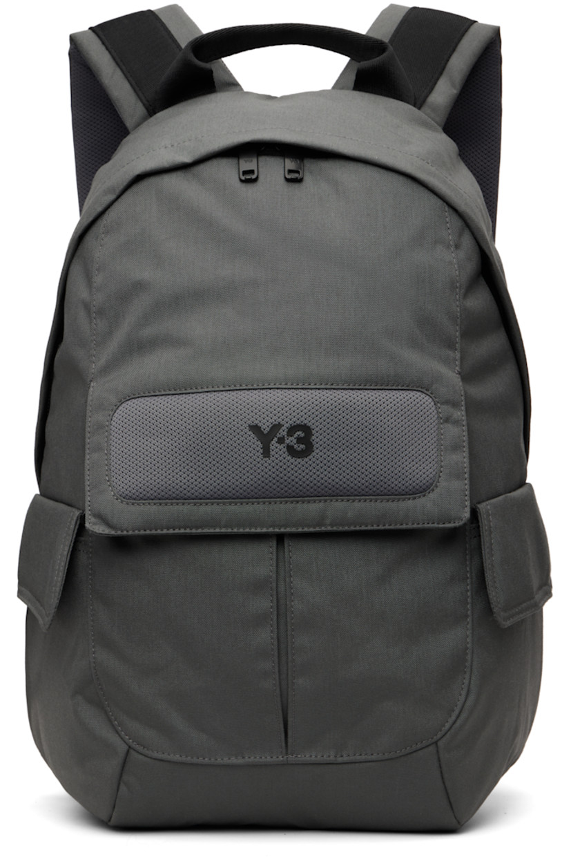 CORDURA® canvas backpack.

· Fixed carry handle
· Adjustable padded shoulder straps
· D-ring at strap
· Mesh panel with bonded logo at face
· Flap pocket at face and sides
· Padded mesh back face
· Two-way zip closure
· D-ring and zip pocket at interior
· Laptop compartment
· Twill lining
· H17" x W14" x D4.5" / 35 L

Supplier color: Granite