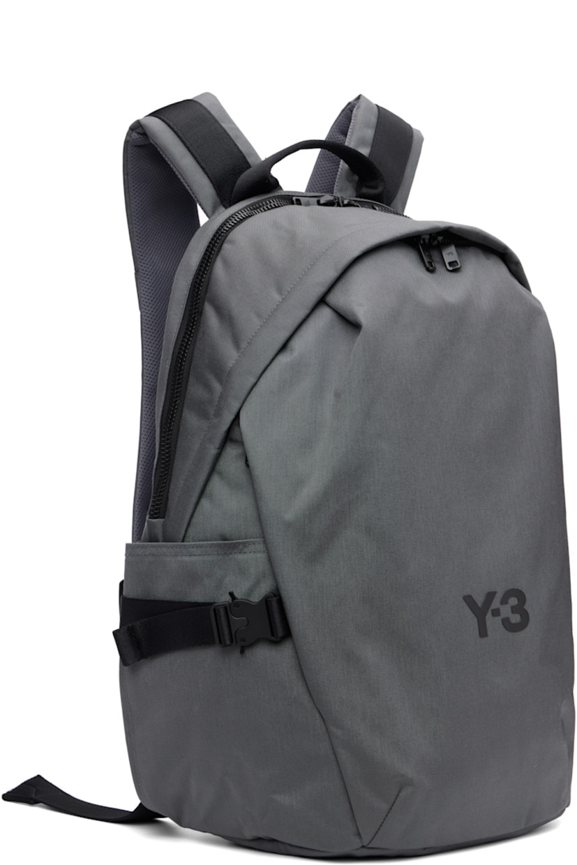 CORDURA® nylon canvas backpack. Zip compartment at base with detachable waterproof bag cover.

· Webbing carry handle
· D-ring at adjustable padded shoulder straps
· Sternum strap
· Zip pocket at face
· Logo bonded at face and shoulder strap
· Pockets with rollercoaster cinch buckles at sides
· Padded mesh back face
· Two-way zip closure
· Padded laptop compartment and patch pocket
· Satin twill lining
· H17.75" x W13" x D7.5" / 35 L

Supplier color: Granit