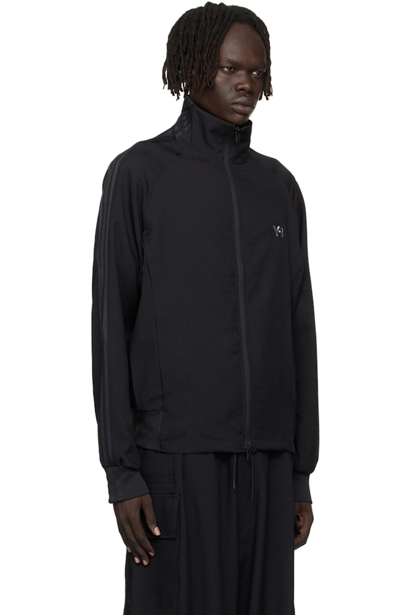 Recycled polyester twill track jacket.

· Stand collar
· Two-way zip closure
· Logo printed at chest
· Seam pockets at waist
· Stripe appliqués at raglan sleeves
· Rib-knit cuffs

Supplier color: Black