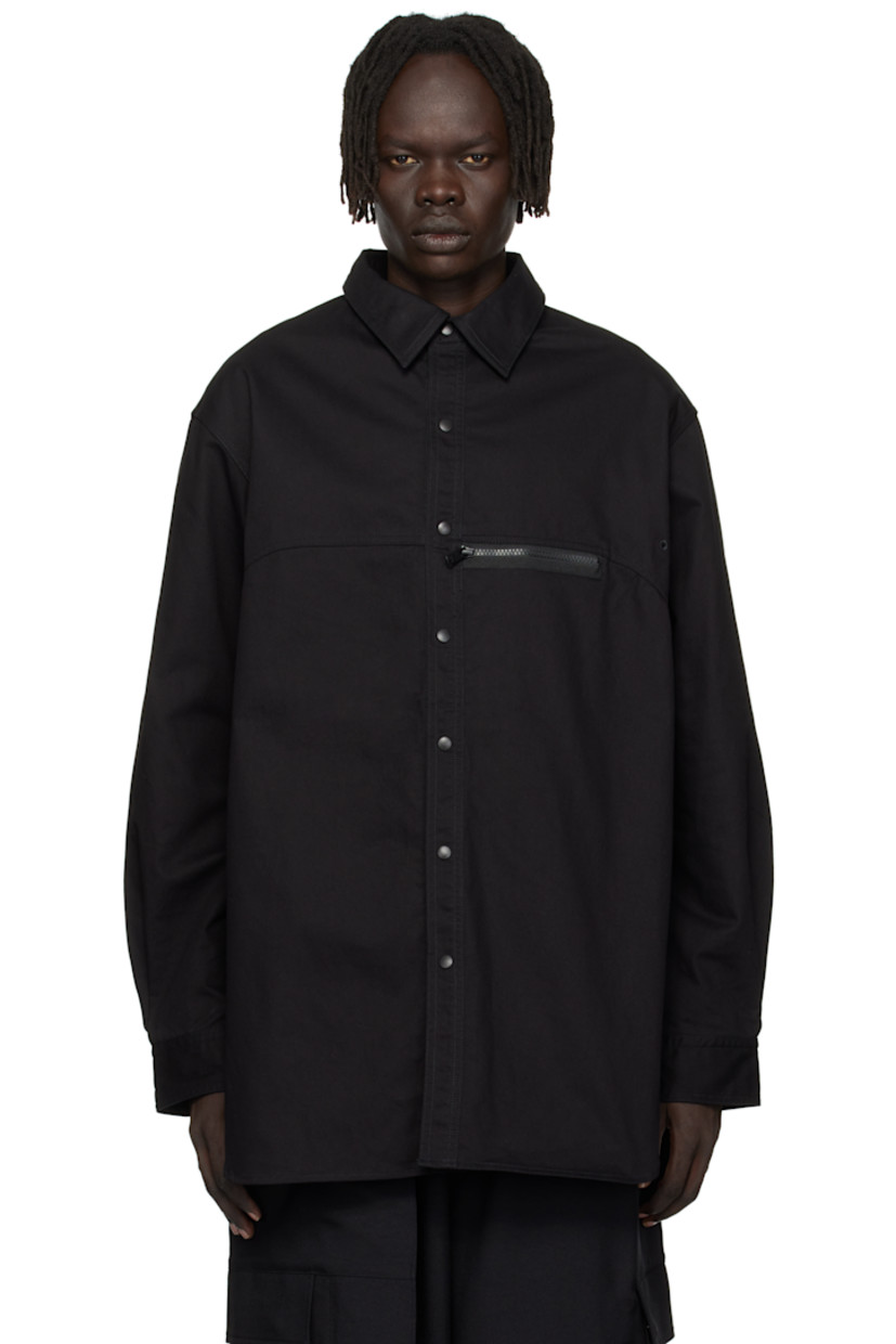 Cotton-blend twill overshirt.

· Spread collar
· Press-stud closure
· Zip pocket at chest
· Shirttail hem
· Embroidered eyelets at armscyes and back yoke
· Adjustable press-stud barrel cuffs 
· Logo bonded at back yoke

Supplier color: Black