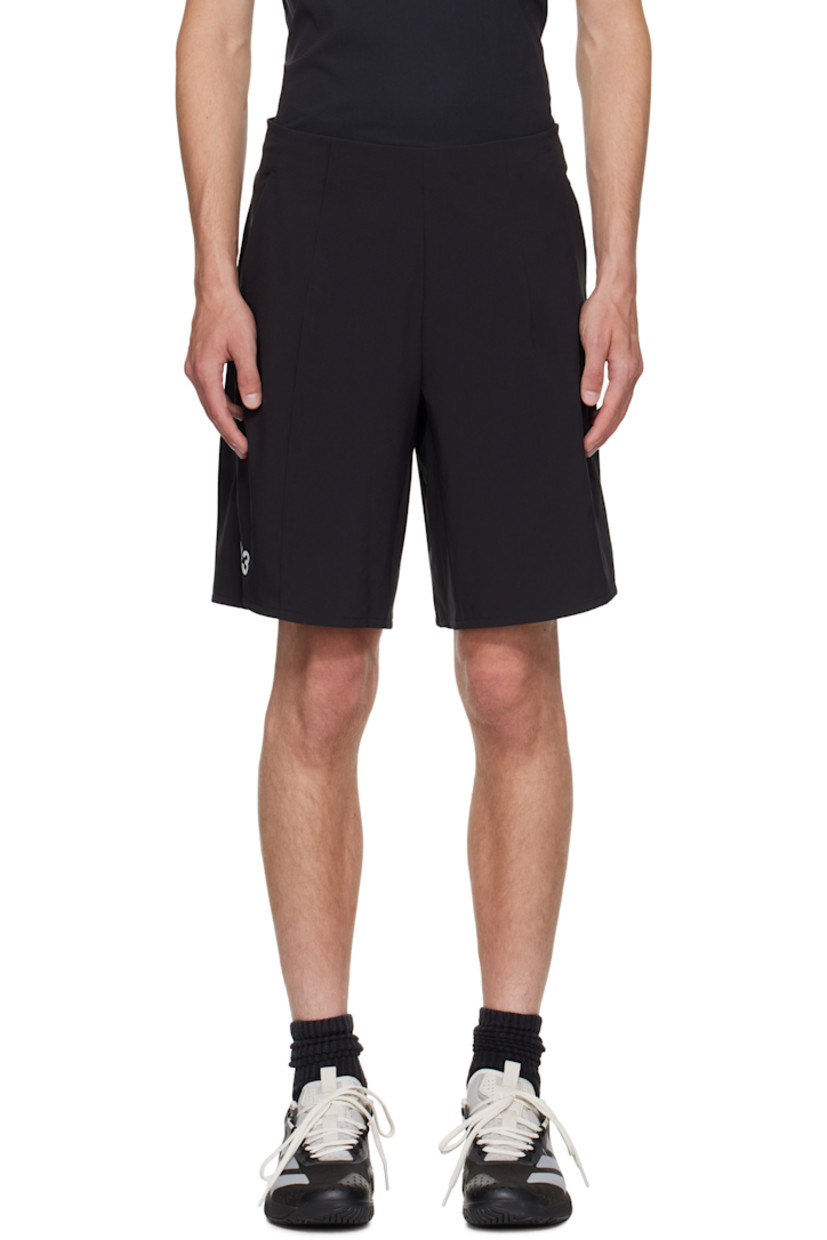 Stretch recycled jersey shorts.

· Concealed drawstring at elasticized waistband
· Two-pocket styling 
· Darts and exposed offset seam at front 
· Bonded logo patch at leg 
· Vented side seams 
· Bonded text at back waist 

Part of the US Open capsule.

Supplier color: Black