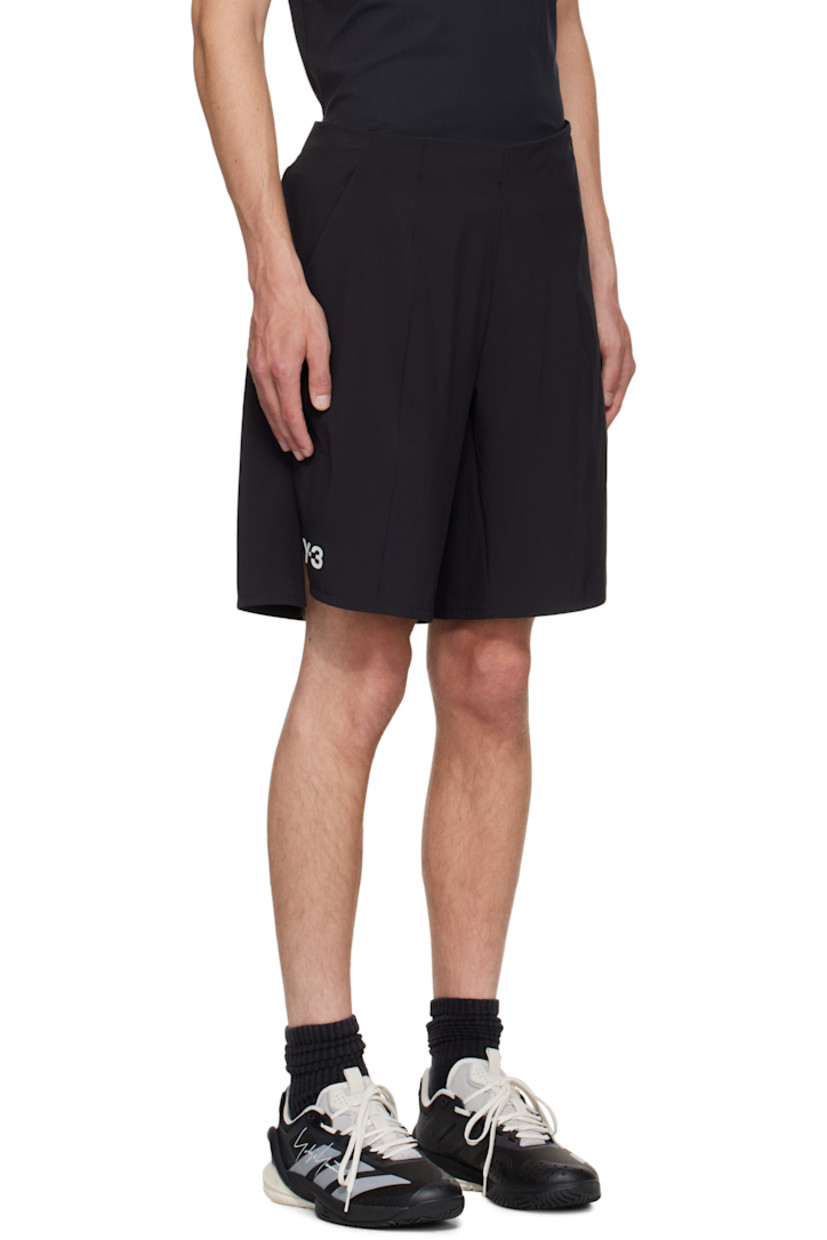 Stretch recycled jersey shorts.

· Concealed drawstring at elasticized waistband
· Two-pocket styling 
· Darts and exposed offset seam at front 
· Bonded logo patch at leg 
· Vented side seams 
· Bonded text at back waist 

Part of the US Open capsule.

Supplier color: Black