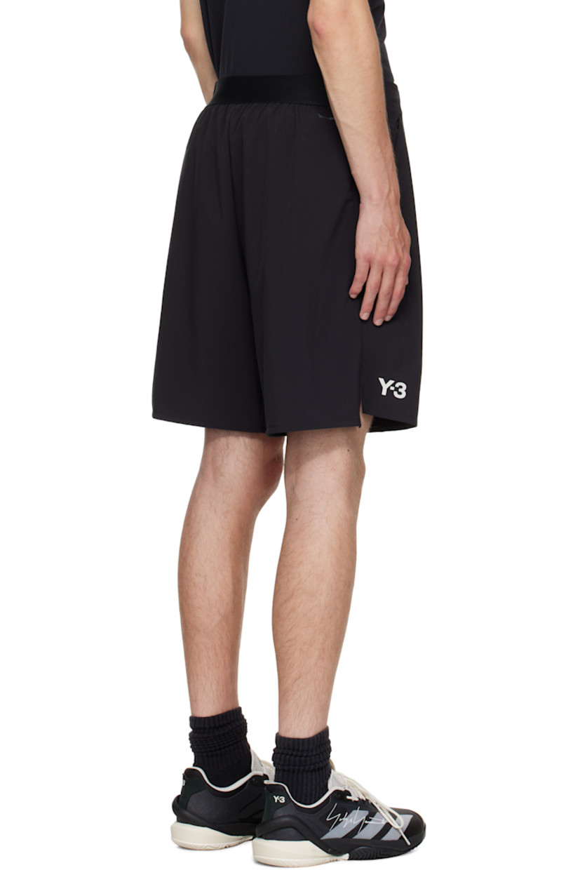 Stretch recycled jersey shorts.

· Concealed drawstring at elasticized waistband
· Two-pocket styling 
· Darts and exposed offset seam at front 
· Bonded logo patch at leg 
· Vented side seams 
· Bonded text at back waist 

Part of the US Open capsule.

Supplier color: Black