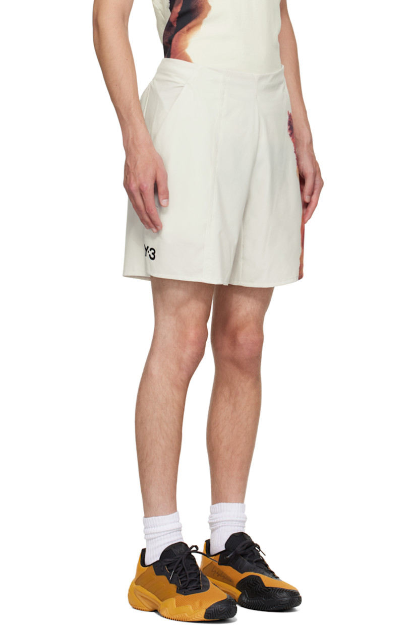 Stretch cotton-blend jersey shorts. Includes removable stretch recycled jersey compression shorts. 

· Concealed drawstring at elasticized waistband 
· Two-pocket styling
· Offset exposed seam at front 
· Bonded logo at front hem 
· Graphic printed at outseam 
· Vented outseams
· Bonded text at back waist

Part of the US Open capsule.

Supplier color: Orbit grey