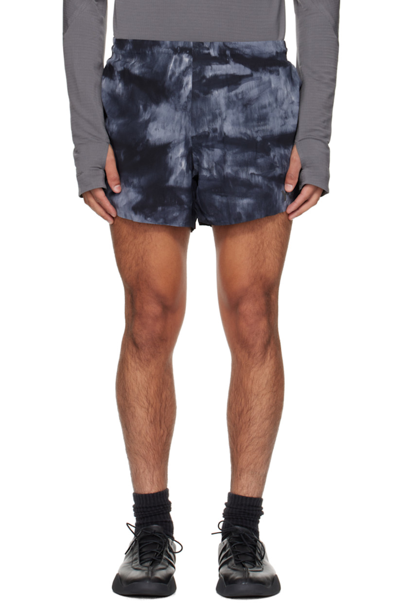 Stretch nylon seersucker shorts.

· Graphic pattern printed throughout
· Concealed drawstring at elasticized waistband
· Three-pocket styling
· Reflective logo printed at front
· Vented cuffs
· Briefs-style jersey lining

Supplier color: Black/Multicolor